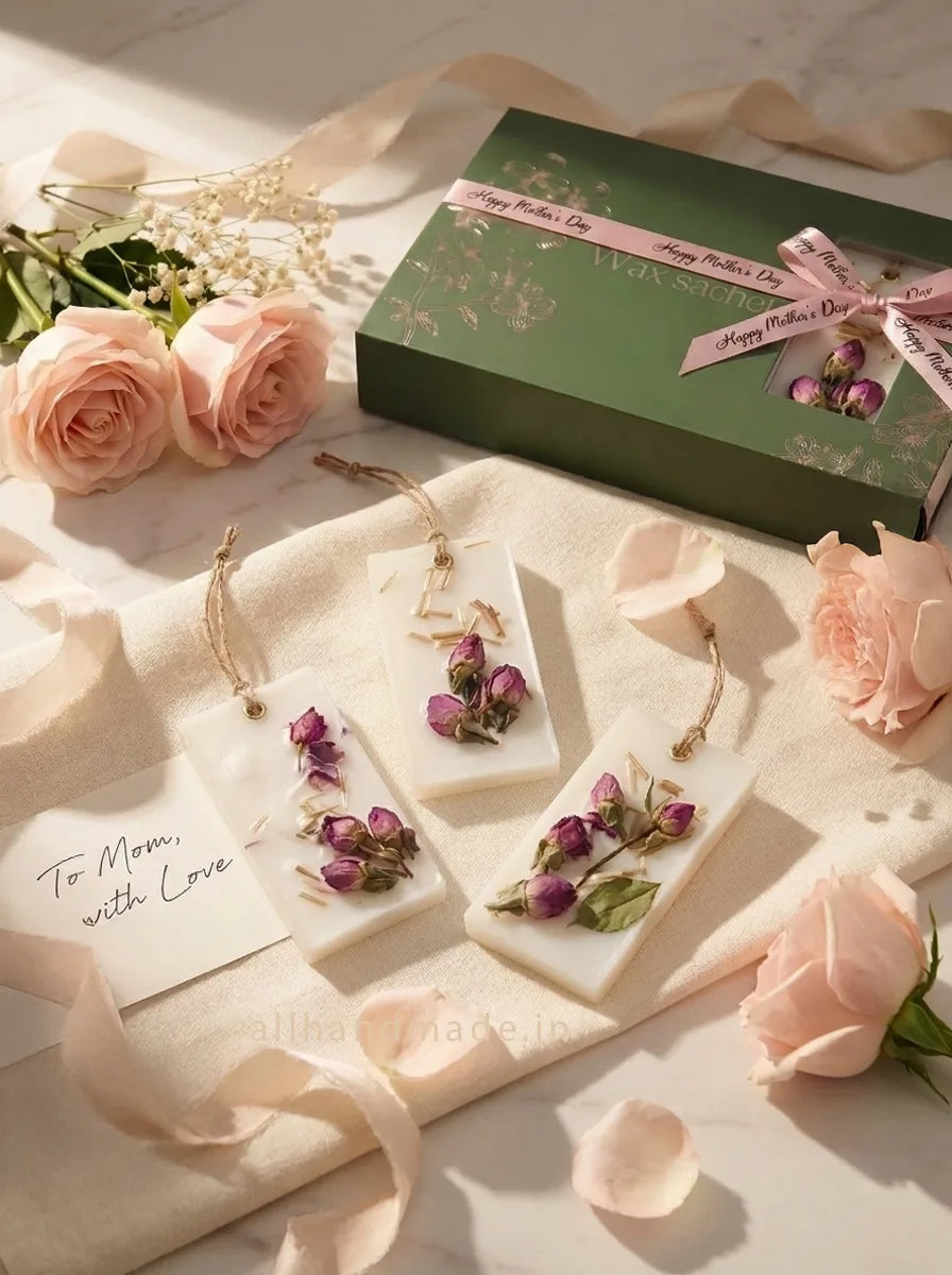 mother's day wax sachet gift set with dried rose buds and floral decorations